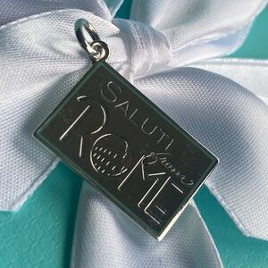 New, Tiffany & Co. “Greeting from Rome” sterling silver postcard charm.